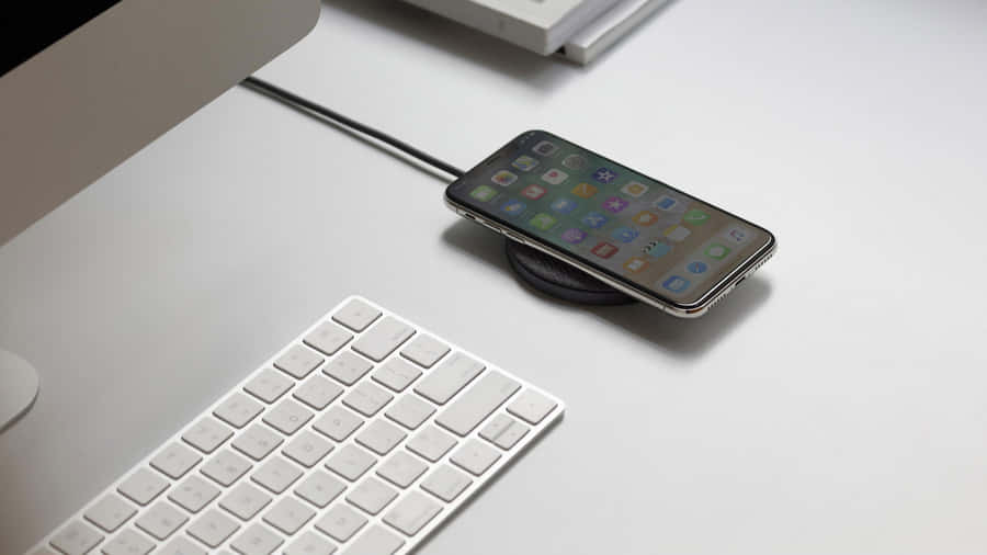 Forget About Cords And Cables, And Enjoy The Convenience Of Wireless Charging. Wallpaper