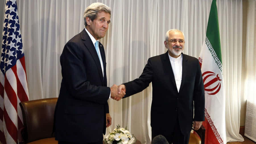 Former U.s. Secretary Of State, John Kerry, In Discussion With Iran's Foreign Minister Wallpaper
