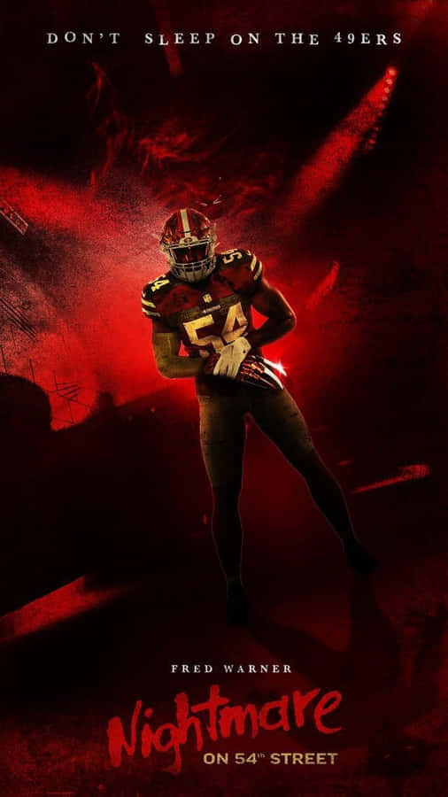 Fred Warner Dominating On Field In A Night Game Wallpaper