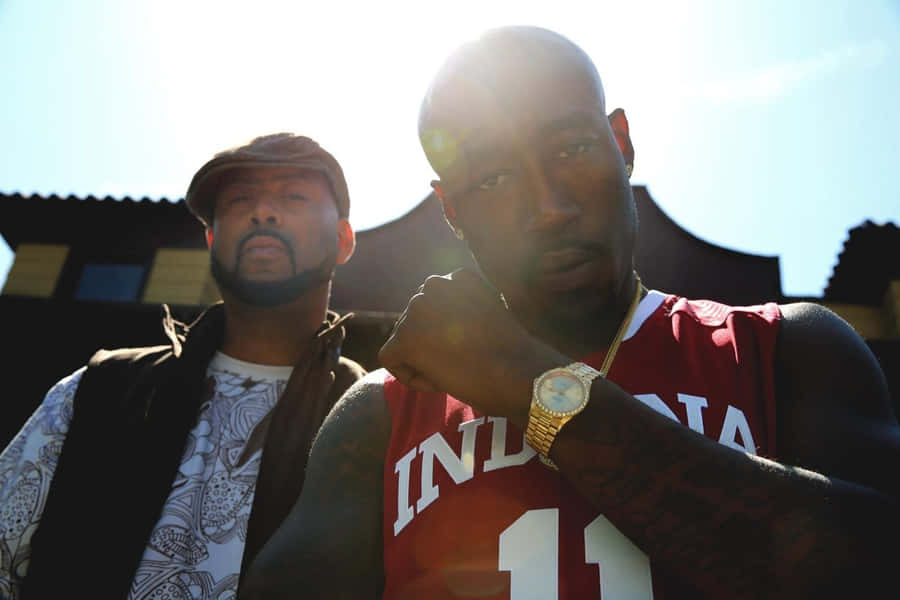 Freddie Gibbsand Friend Outdoors Wallpaper