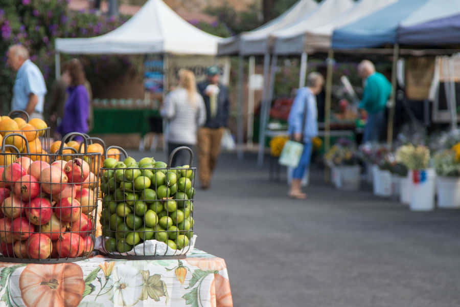 Fresh Produce At A Vibrant Farmers Market Wallpaper