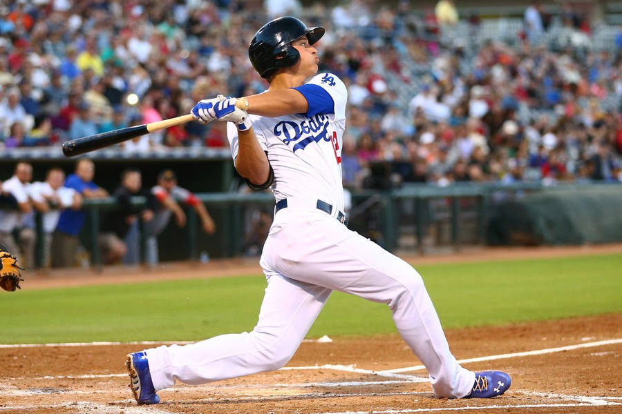 Full Body Photo Of Corey Seager Swinging Bat Wallpaper