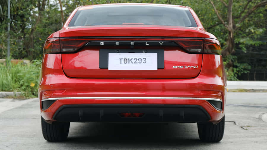 Geely Emgrand Gliding Down The Highway Wallpaper