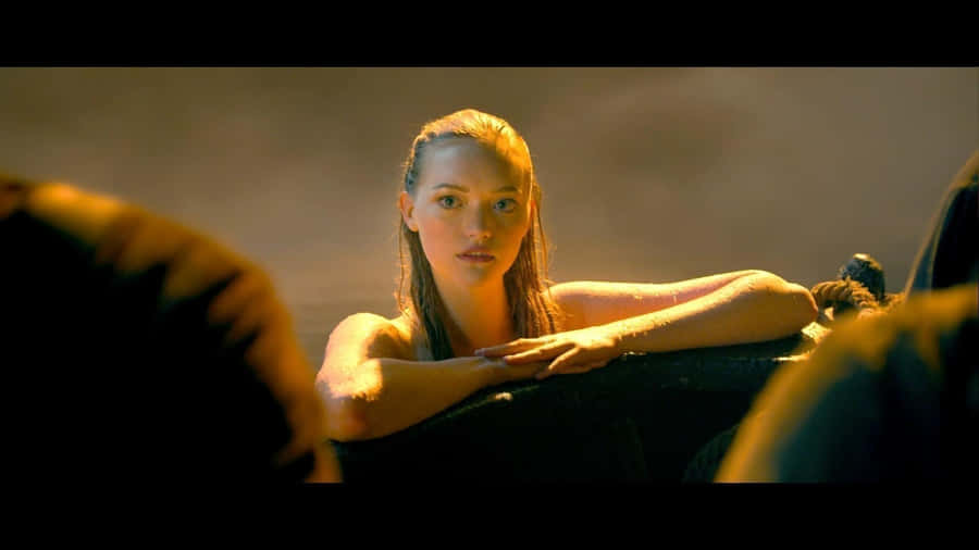 Gemma Ward Staring Intensely In A Captivating Photoshoot Wallpaper