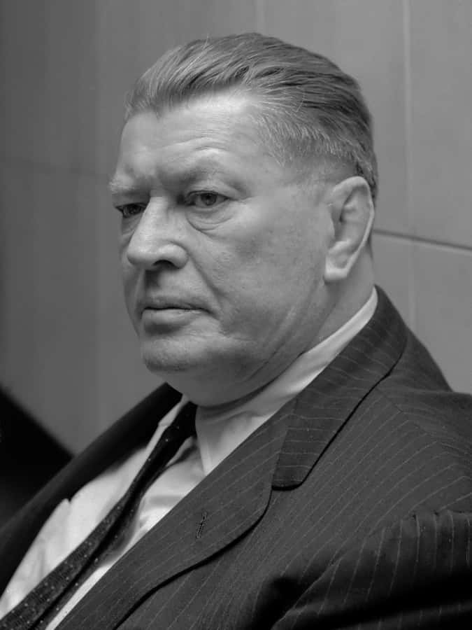 Gene Tunney At A 1965 Press Conference Wallpaper