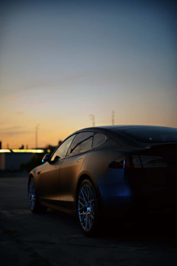 Get Charged Up For The Future With The Tesla Iphone Wallpaper