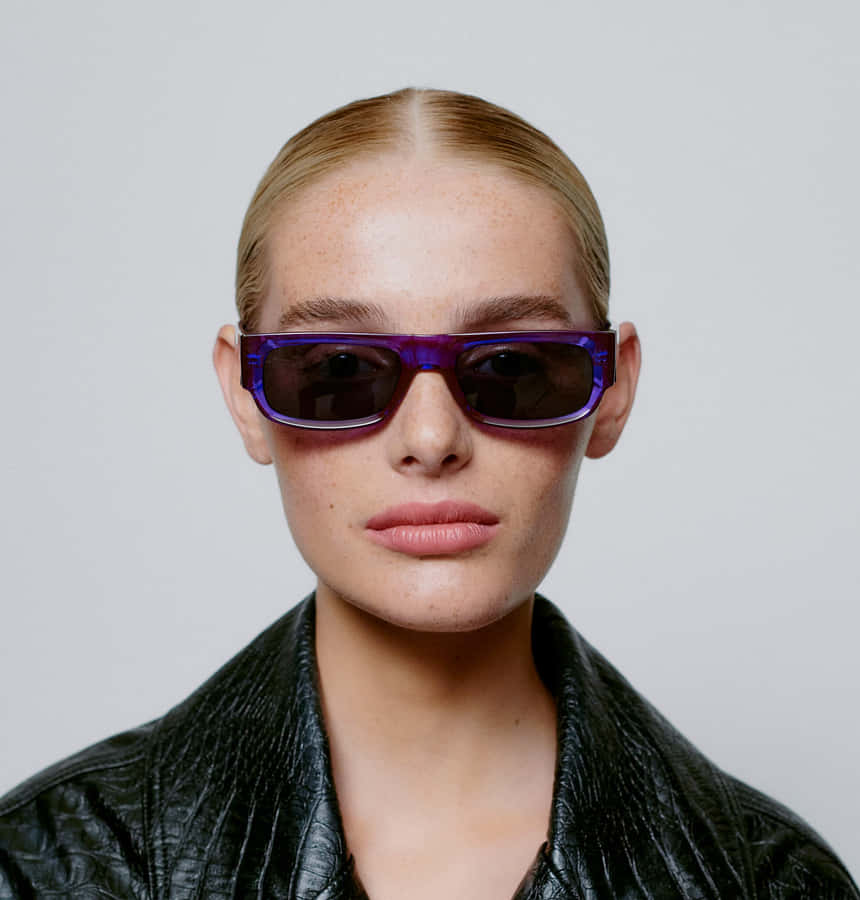 Get Ready For Summer In These Chic And Stylish Purple Sunglasses Wallpaper