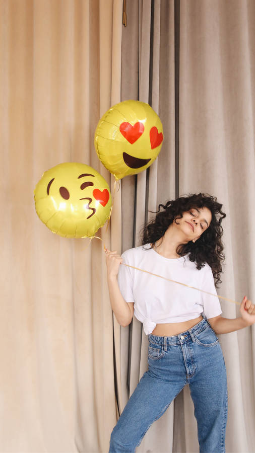 Girl And Two Emojis Wallpaper