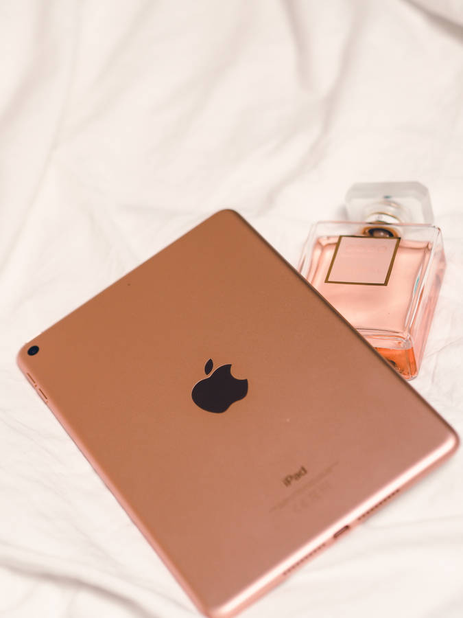 Girly Phone Gadget And Perfume Wallpaper