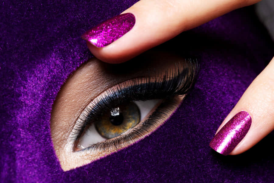 Glamorous Purple Nail Polishand Eye Makeup Wallpaper