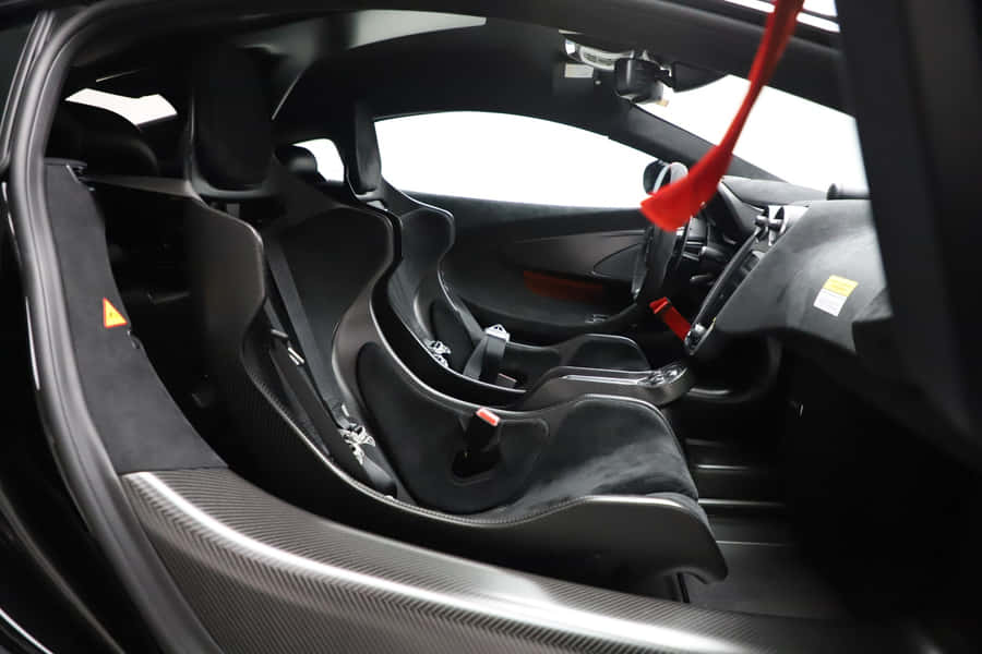 Gleaming Mclaren 620r Ready To Conquer The Road Wallpaper