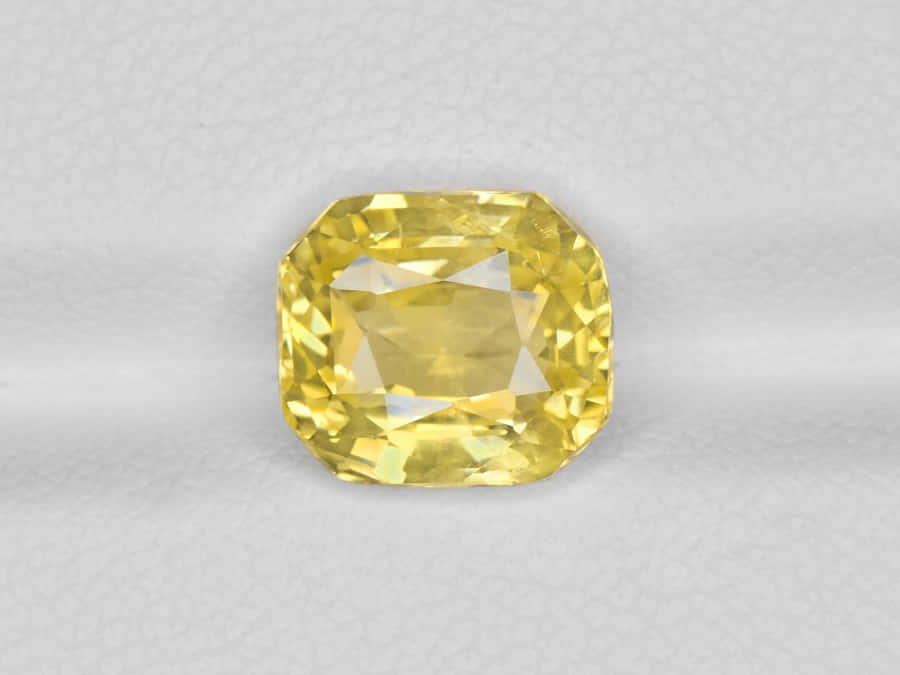 Gleaming Yellow Sapphire - A Symbol Of Prosperity Wallpaper