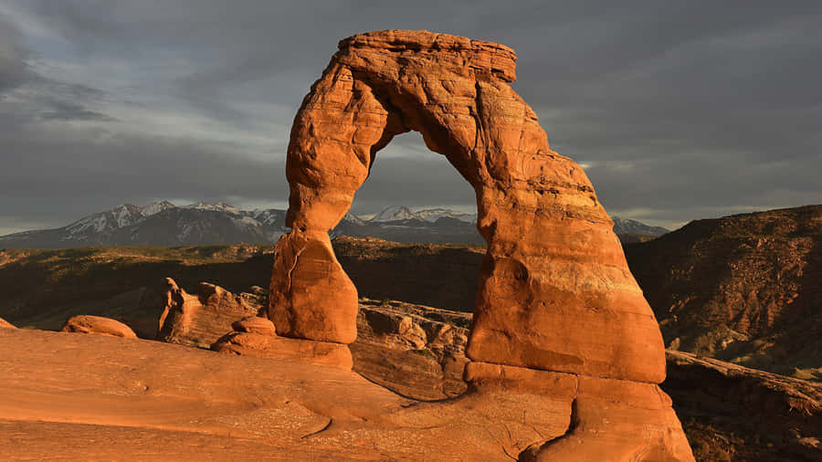 Gloomy Skies On Delicate Arch Wallpaper