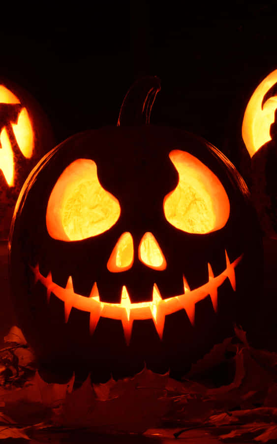 Glowing Halloween Pumpkin Carving Wallpaper
