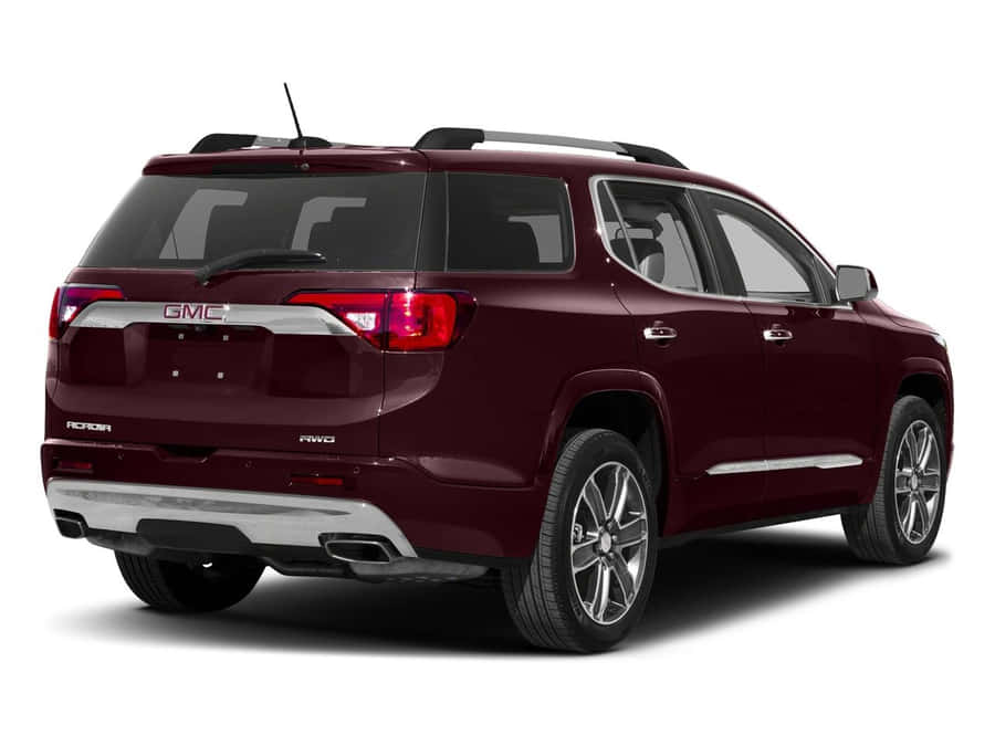 Gmc Acadia Driving On A Sunny Day Wallpaper