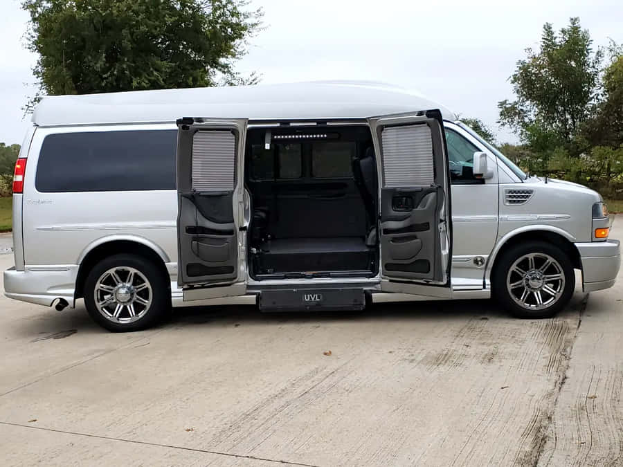 Gmc Savana Van On The Road Wallpaper