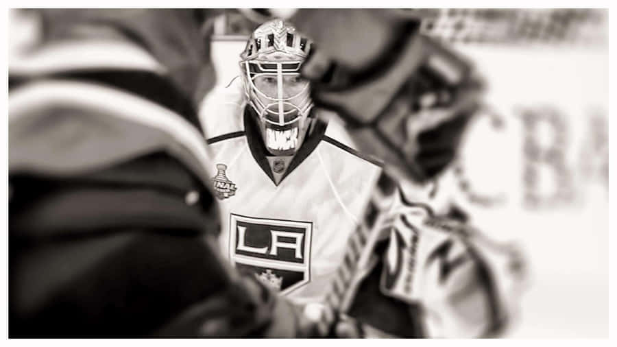 Goaltender Jonathan Quick #32 Of The Los Angeles Kings Blocks A Shot Wallpaper