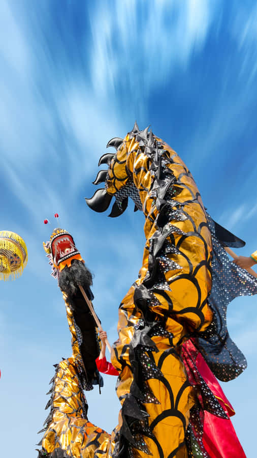 Golden Dragon Dance Performance Wallpaper