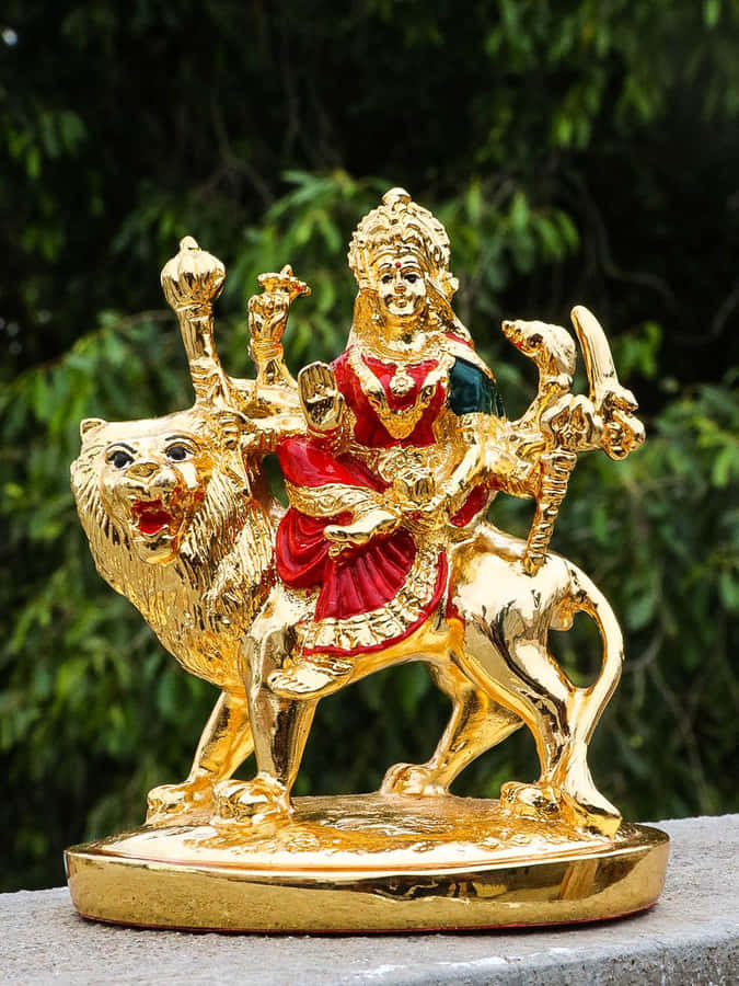 Golden Durga Statueon Lion Wallpaper