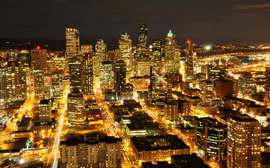 Golden Lights Of Seattle At Night Wallpaper