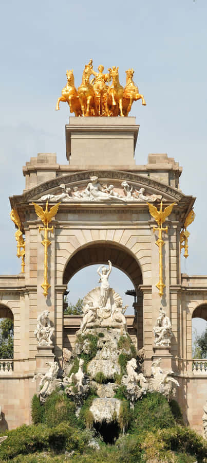 Golden Sunset On A Rocky Beach Wallpaper