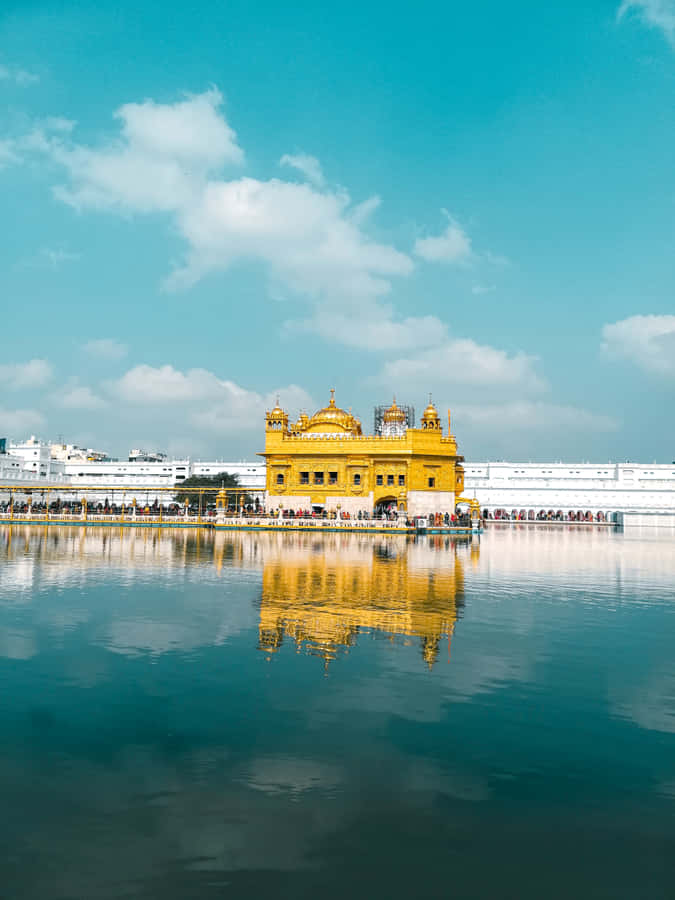 Golden Temple And Worshippers Wallpaper