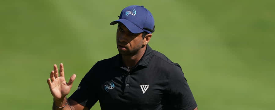 Golfer Gesturing During Game Wallpaper