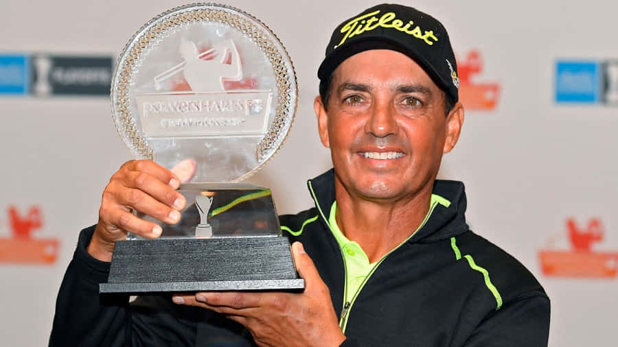 Golferwith Trophy Smile Wallpaper