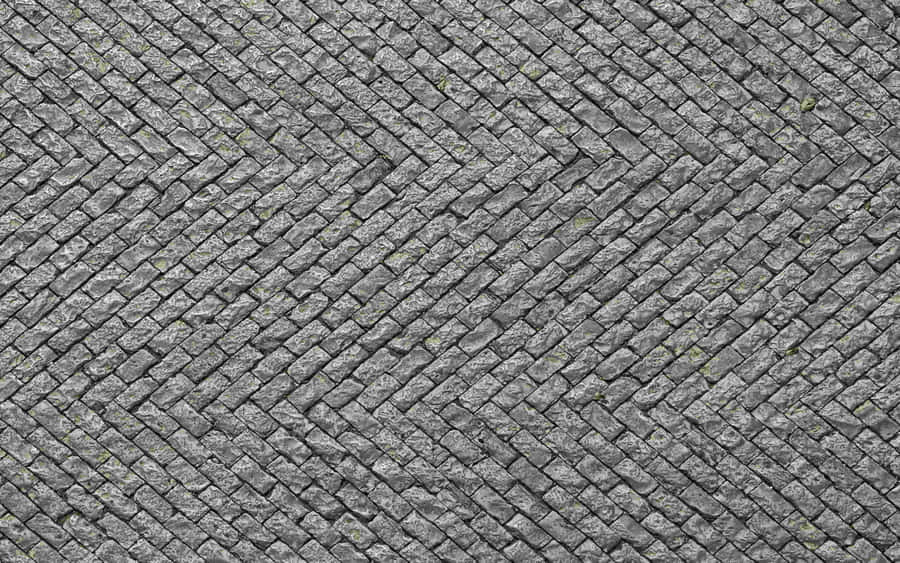 Grey Herringbone Pattern Paving Wallpaper