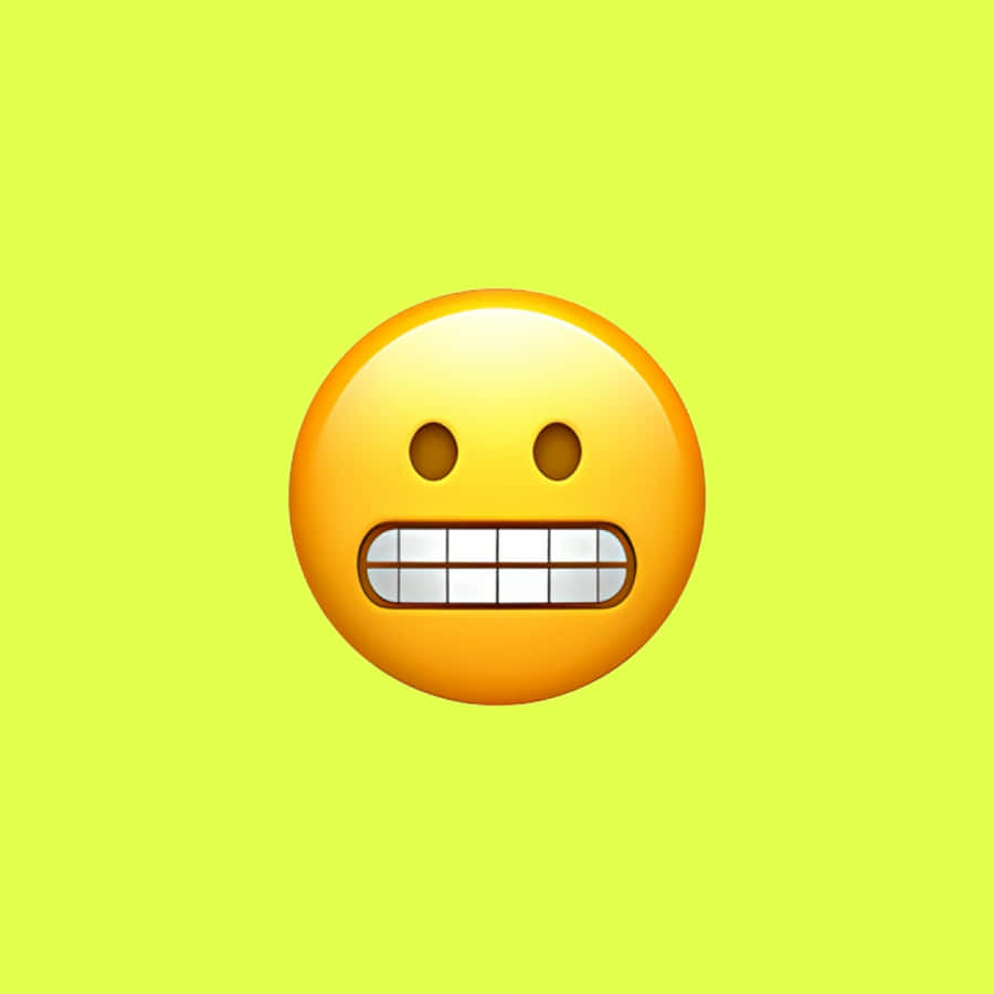 Grimacing Emoji Yellow Background Wallpaper