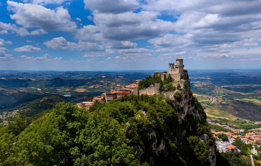 Guaita Tower With Cloudy Sky Wallpaper