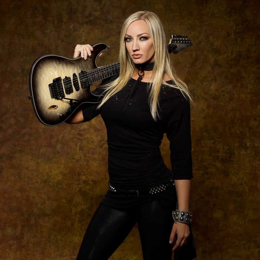 Guitarist_ Nita_ Strauss_ Posing_with_ Instrument Wallpaper