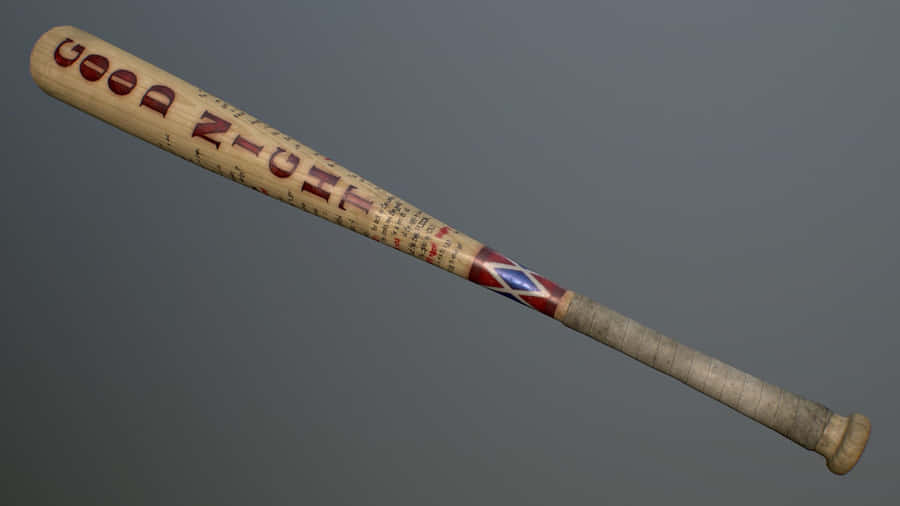 Harley Quinn Swinging Her Iconic Baseball Bat Wallpaper