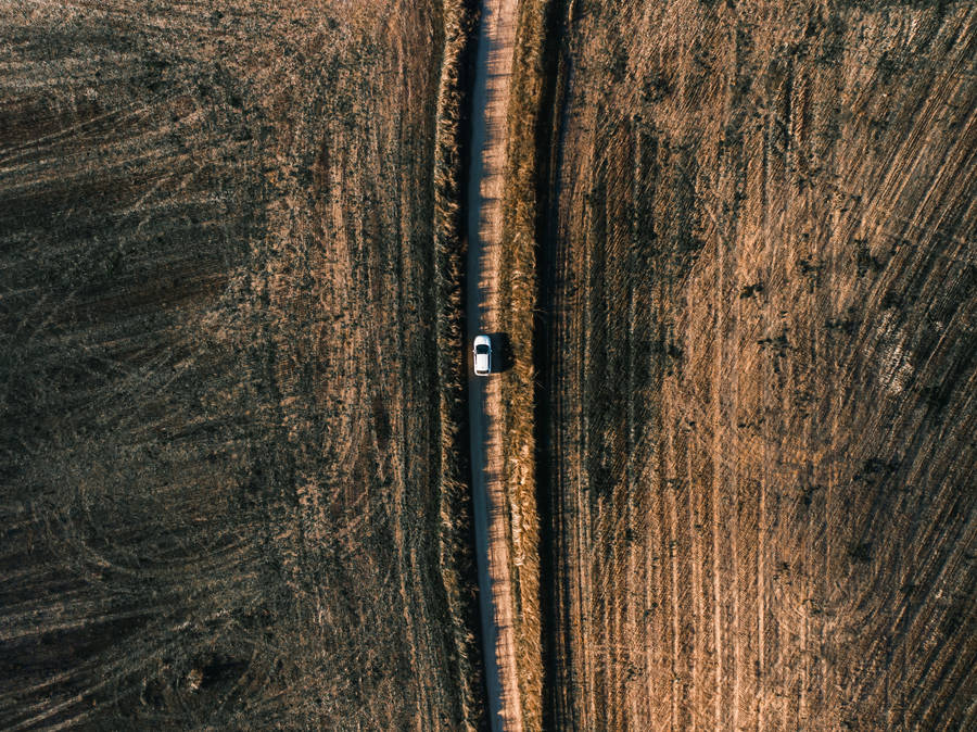 Hd Car On Dirt Aerial View Wallpaper