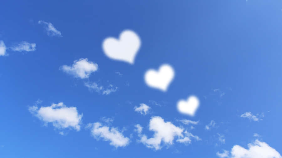 Heart Shaped Clouds In Sky Wallpaper