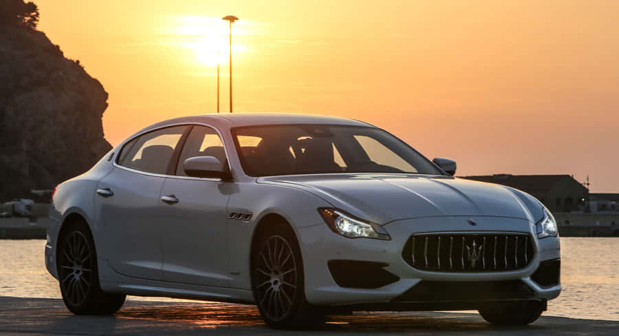 High-performance Maserati Quattroporte In Majestic Atmosphere Wallpaper