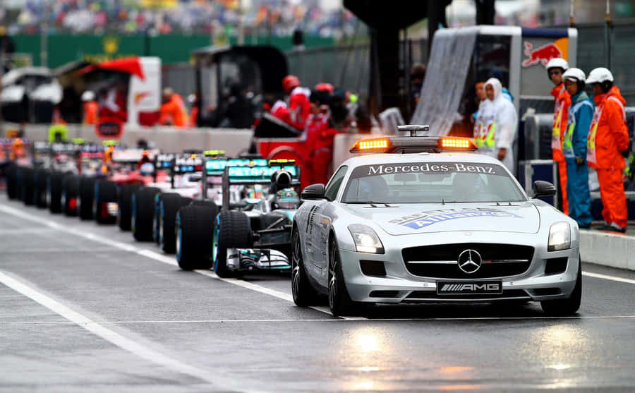 High-performance Safety Car On Racetrack Wallpaper