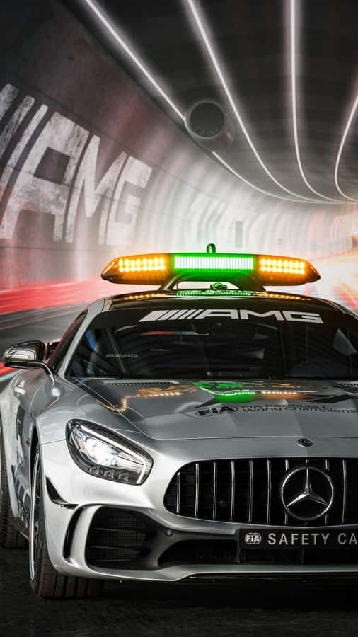 High-performance Safety Car On The Racetrack Wallpaper