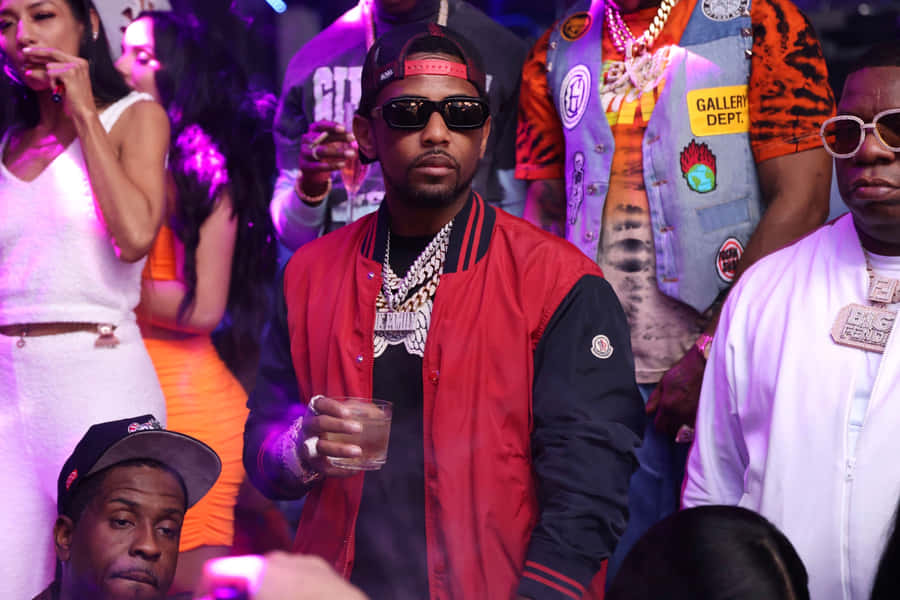 Hip Hop Artist At Club Scene Wallpaper