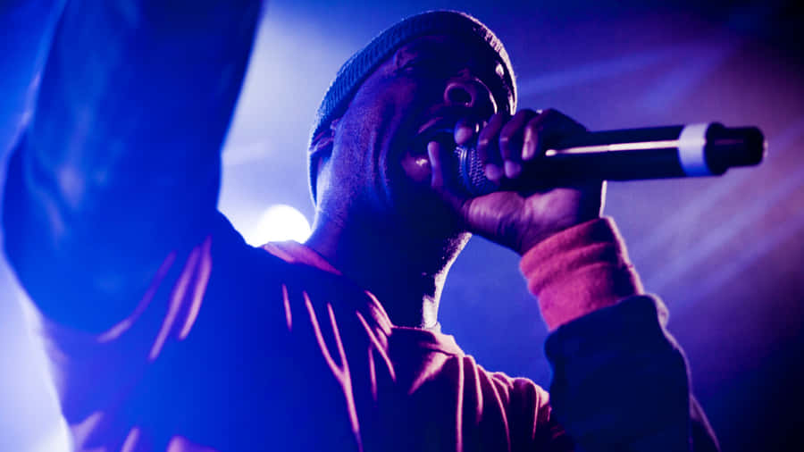 Hip Hop_ Artist_ Performance_in_ Blue_ Lights.jpg Wallpaper