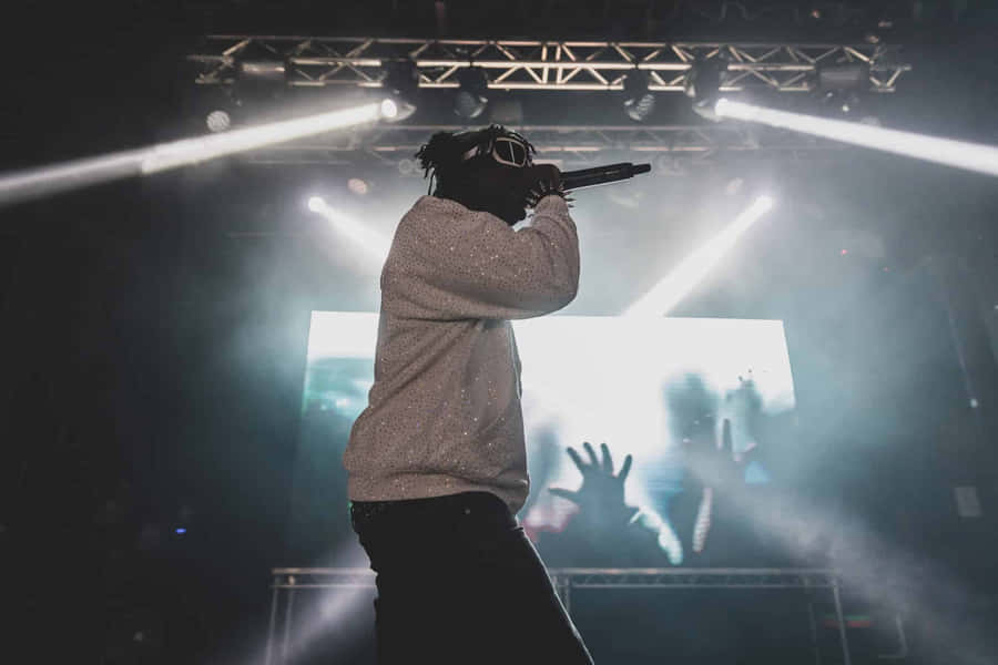 Hip Hop Artist Performing Live Concert Wallpaper