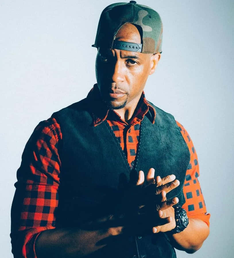 Hip Hop_ Artist_ Stylish_ Pose.jpg Wallpaper