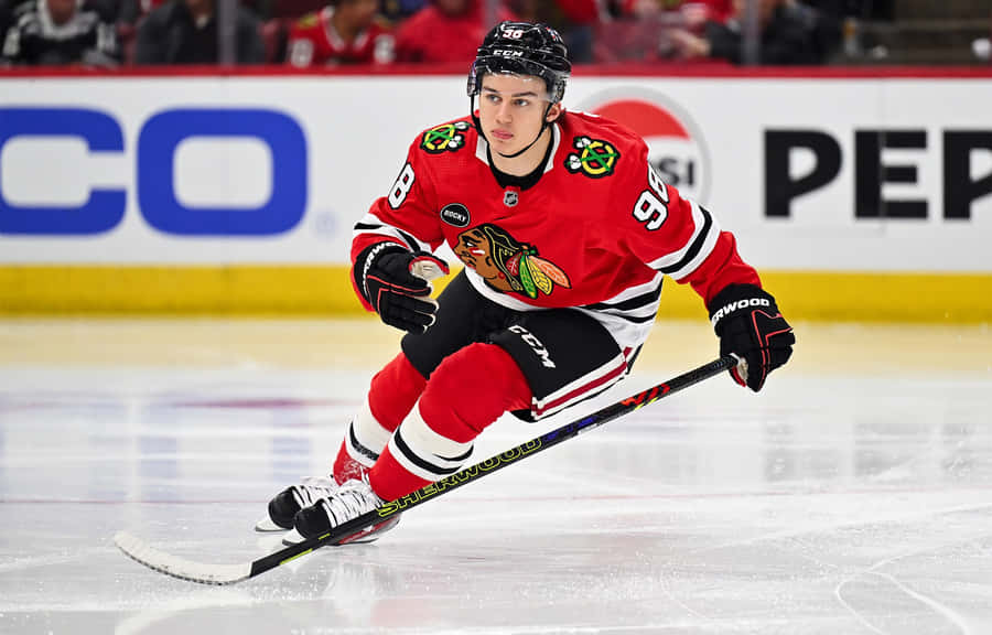 Hockey_ Player_ In_ Action.jpg Wallpaper