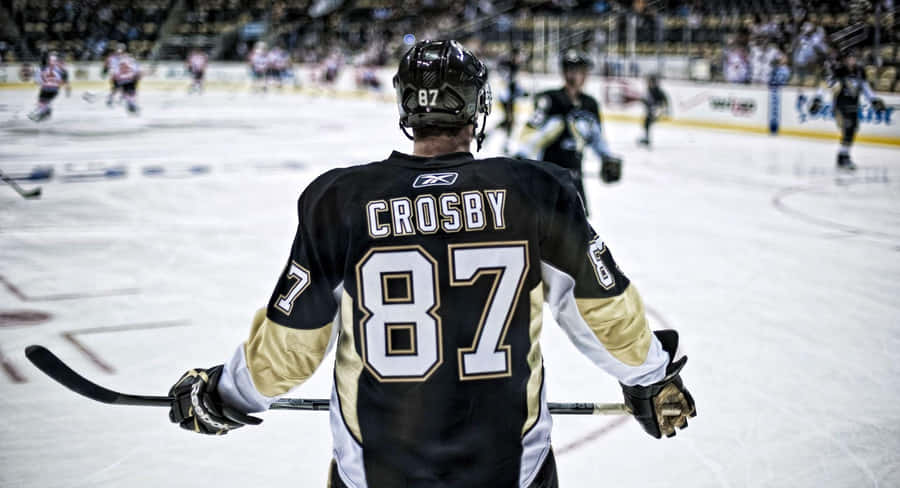 Hockey_ Player_ Number_87_ On_ Ice Wallpaper