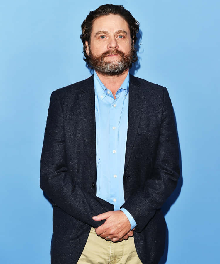 Hollywood Actor Zach Galifianakis Strikes An Offbeat Pose Wallpaper