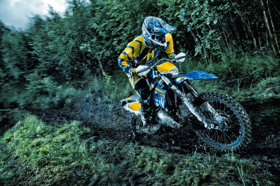 Husqvarna Motorcycle Offroad Action Wallpaper