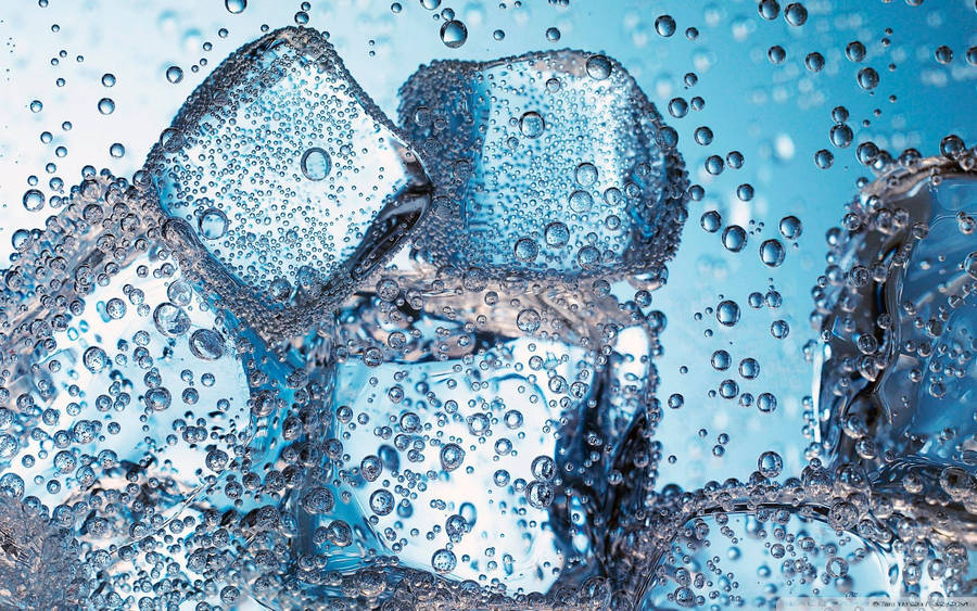 Ice Cubes In Fizzy Water Wallpaper