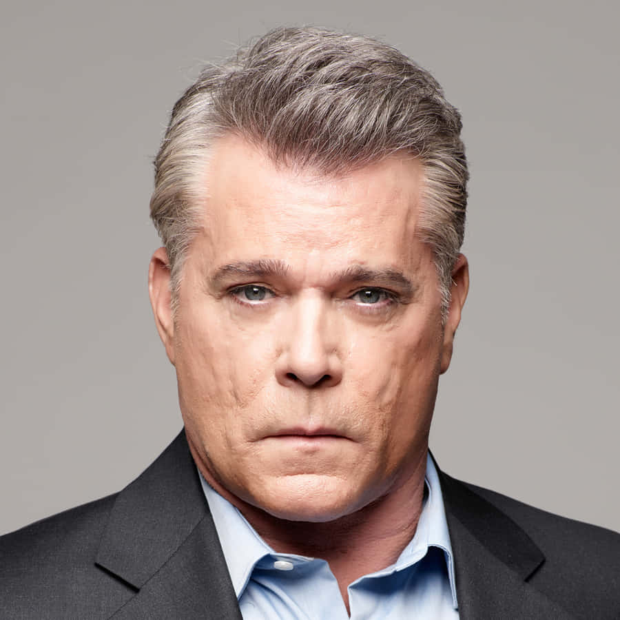 Iconic Actor Ray Liotta In Intense Stare Wallpaper