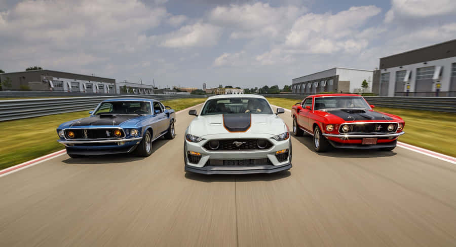 Iconic Ford Mustang Mach 1 Revs Up On The Road Wallpaper