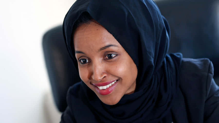 Ilhan Omar Wearing An All-black Outfit Wallpaper